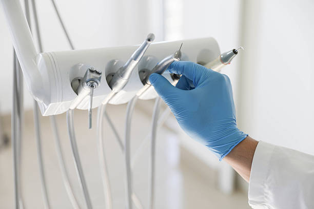 Professional Dental Implants technician working in Groves, TX